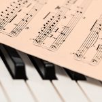 piano keys and sheet music